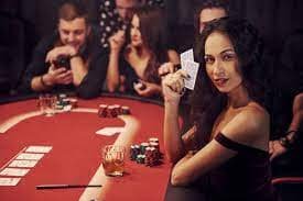 Playtech live-dealer studio with HD camera setup, professional lighting, and croupier at blackjack table